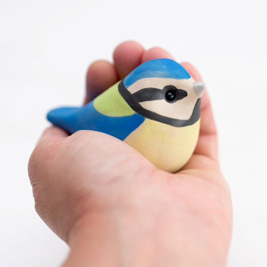 Small Ceramic Blue Tit Sculpture held in a hand