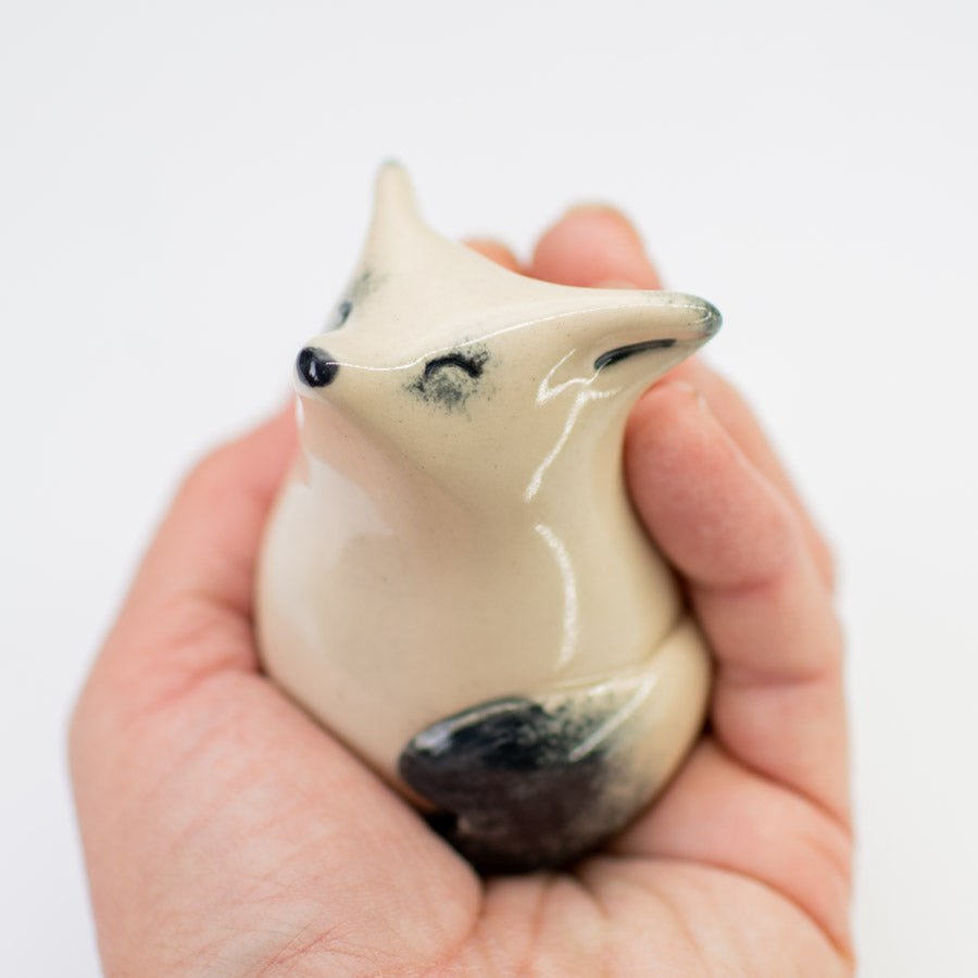Happy Arctic fox figurine - sarahbrabbin