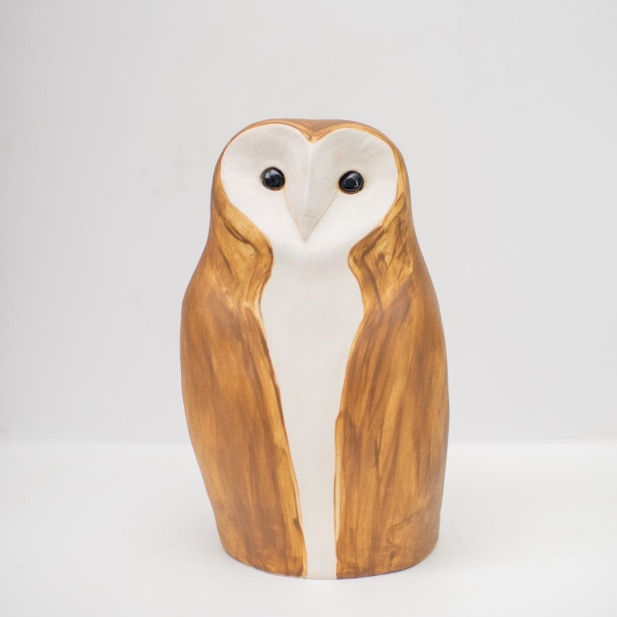 A ceramic Barn Owl sculpture in a watercolour effect brown and white finish with shiny black eyes and a shiny pink beak