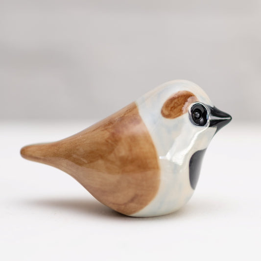 Ceramic Sparrow sculpture for Melanie, brown and white with black beak and eye