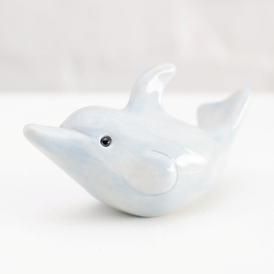 Small ceramic dolphin sculpture