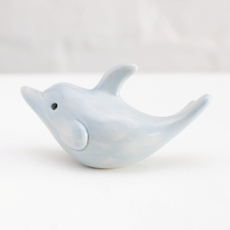 Small ceramic dolphin sculpture