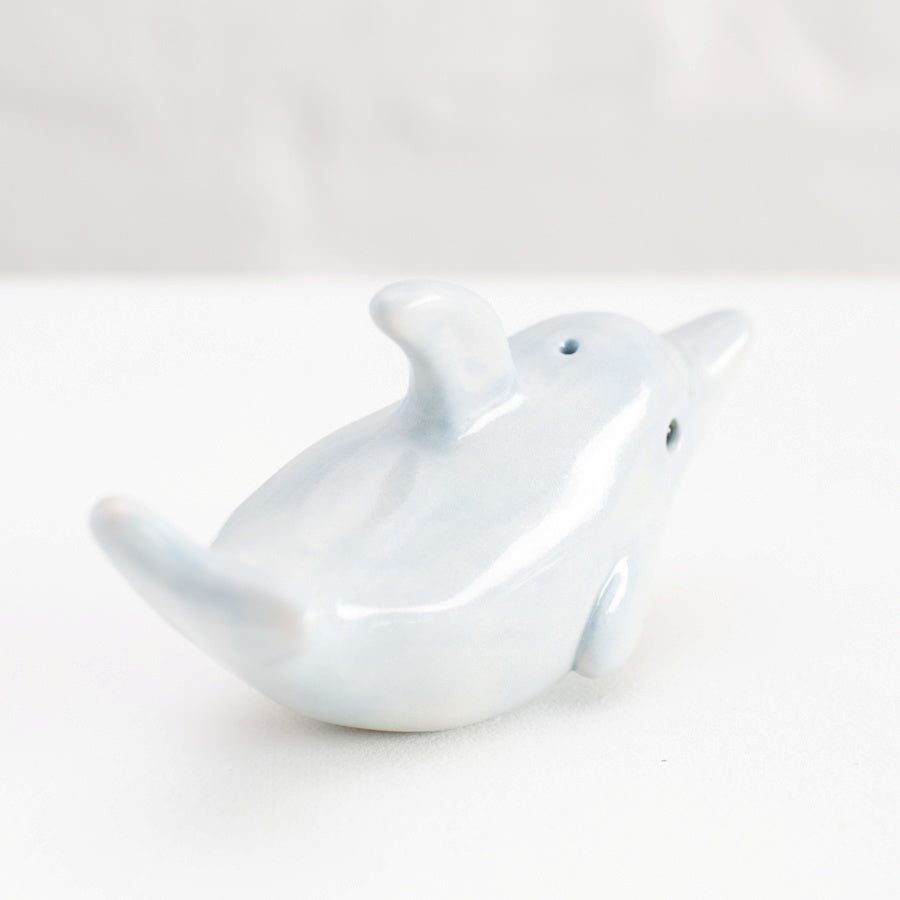 Small ceramic dolphin sculpture