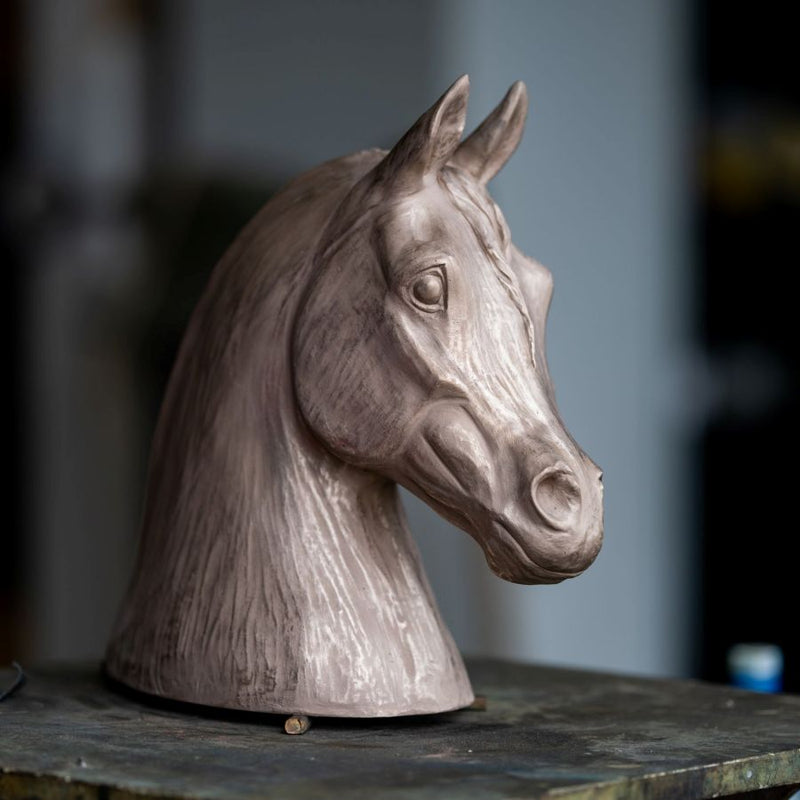 Bronze horse head sculpture