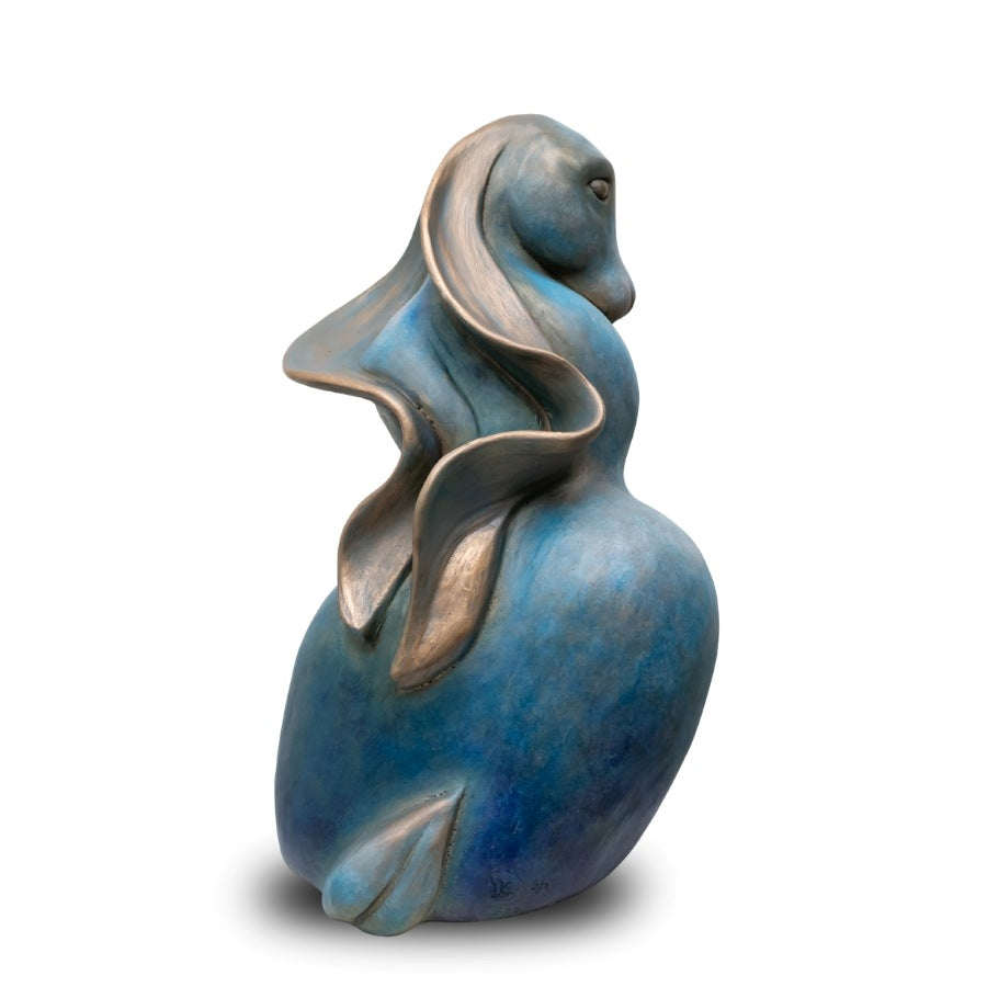 A bronze Hare sculpture against a plain background