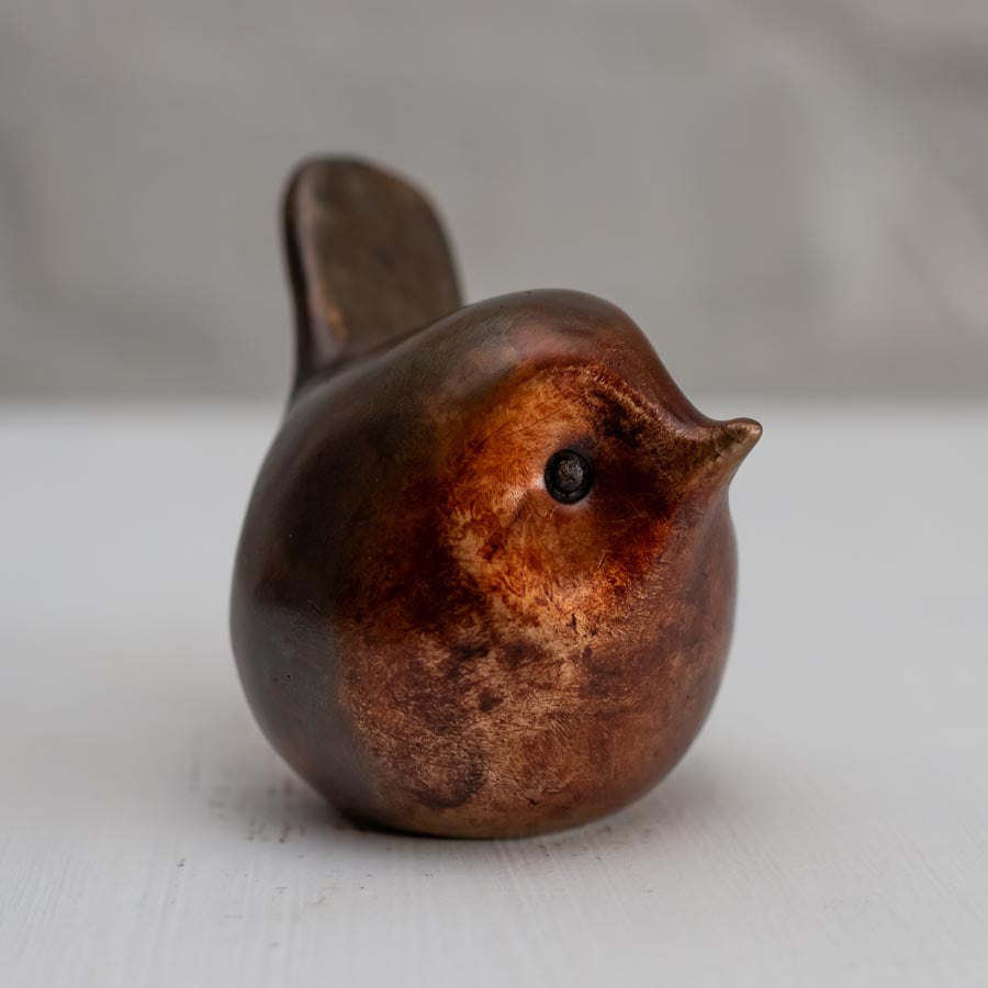 Small Bronze Robin Sculpture on a white background