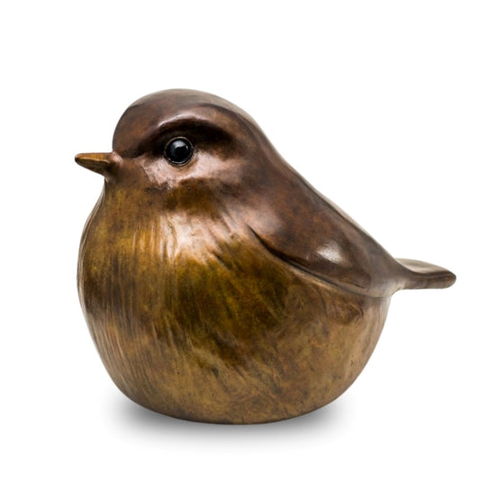 A bronze Robin sculpture against a plain background