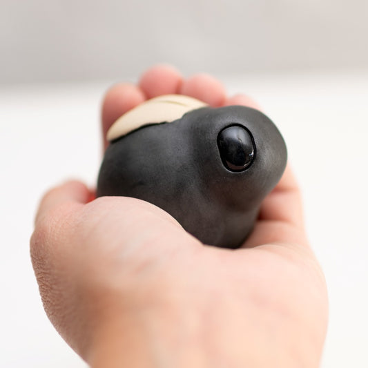 Ceramic Red Tailed Bumble Bee held in a hand