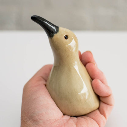 Ceramic Curlew in a hand