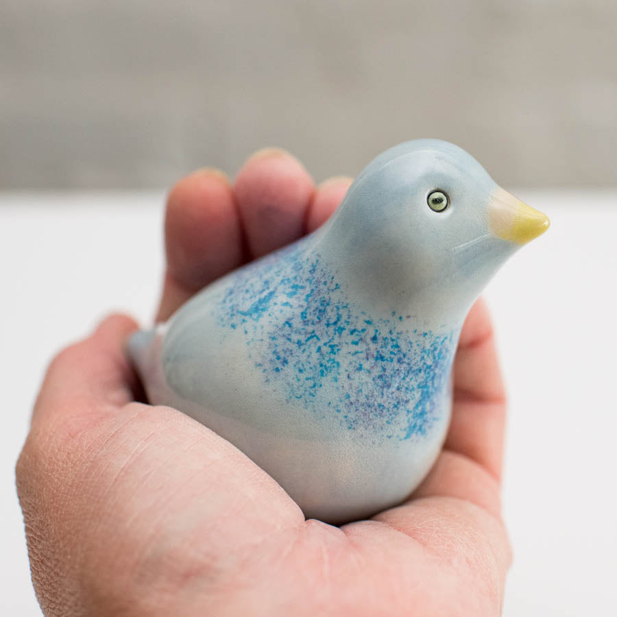 Ceramic Pigeon in a hand