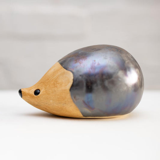 Medium Ceramic Hedgehog Sculpture with iridescent dark grey body and light brown face
