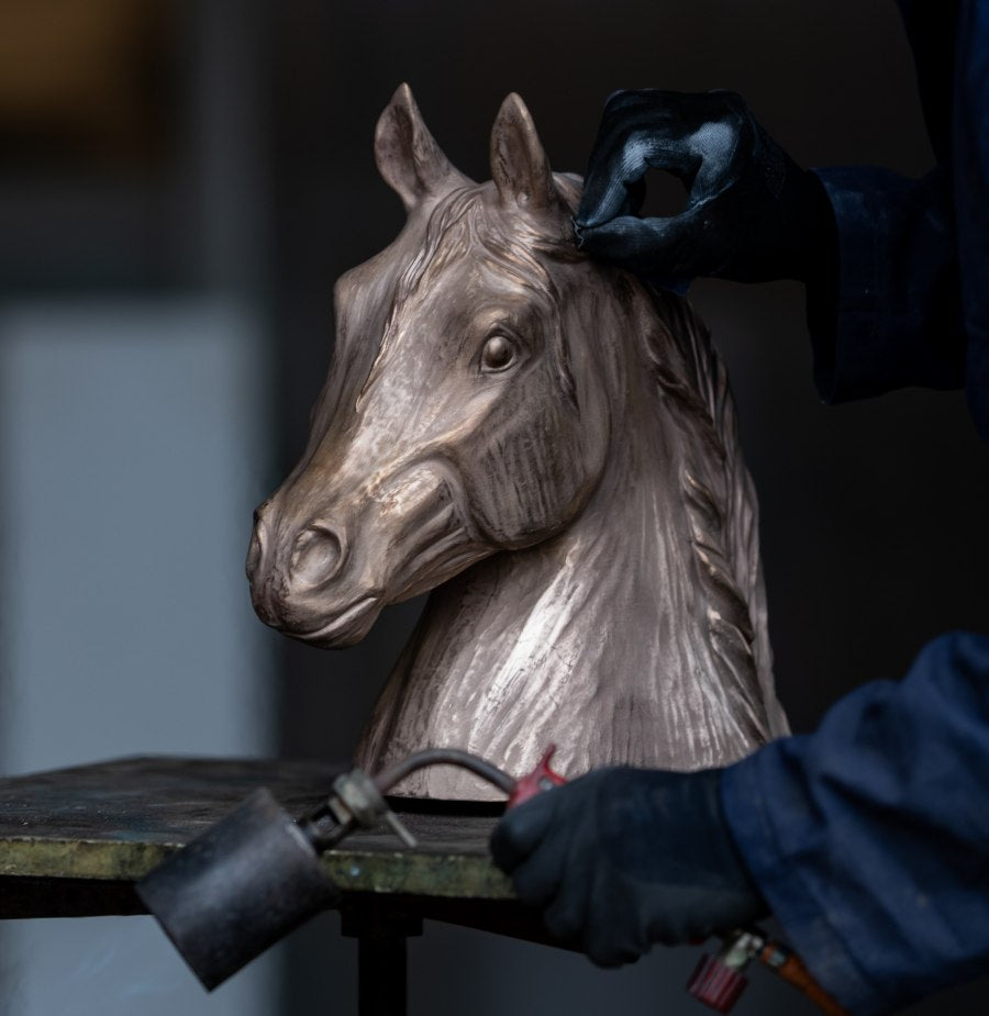 Bronze horse head sculpture