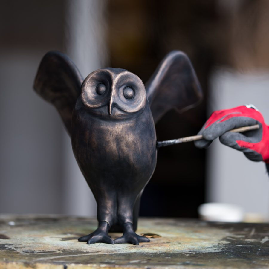 Bronze Owl sculpture having patina applied