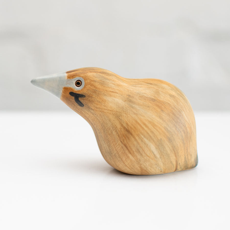 Small ceramic Bittern Sculpture against a white background