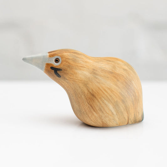 Small ceramic Bittern Sculpture against a white background