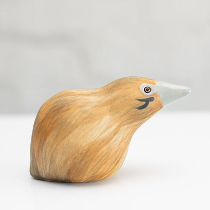 Small ceramic Bittern Sculpture against a white background