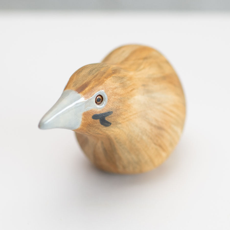 Small ceramic Bittern Sculpture against a white background