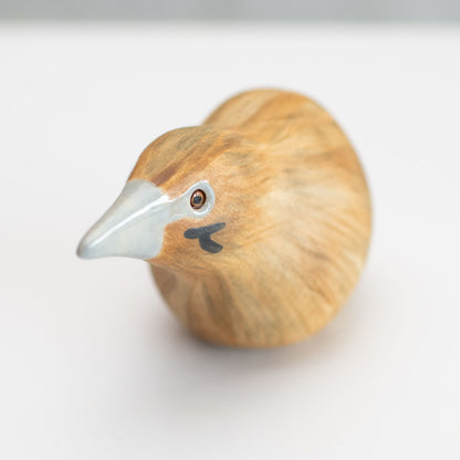 Small ceramic Bittern Sculpture against a white background