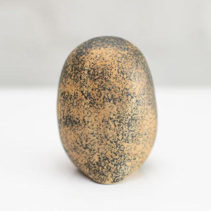 Small ceramic Tawny Owl sculpture against a white background