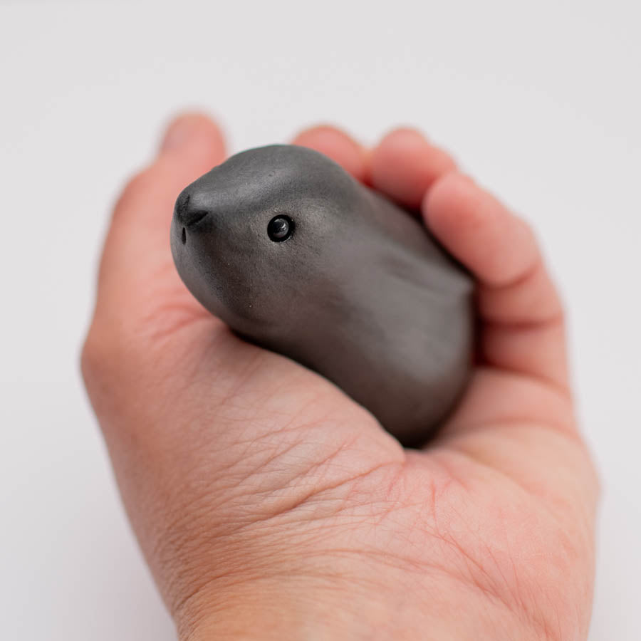 Small ceramic black moongazing hare sculpture