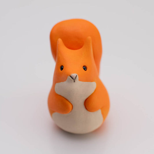 Small ceramic red squirrel sculpture