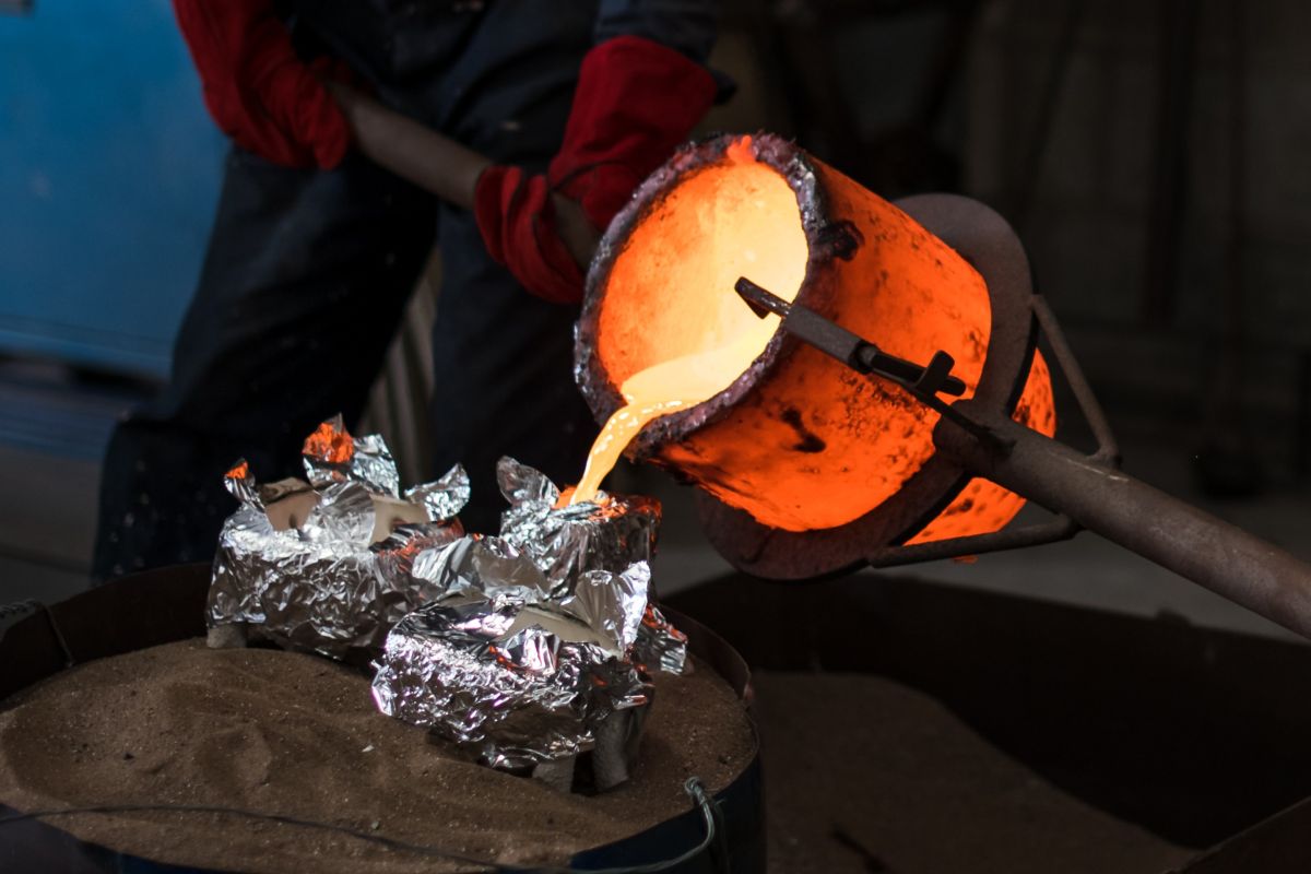 Moulten bronze being poured