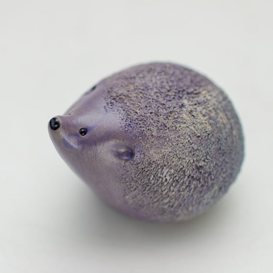 Small purple ceramic hedgehog