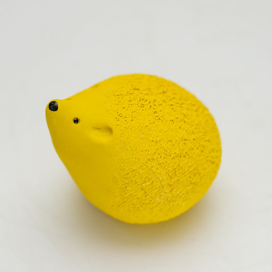 Bright yellow ceramic hedgehog