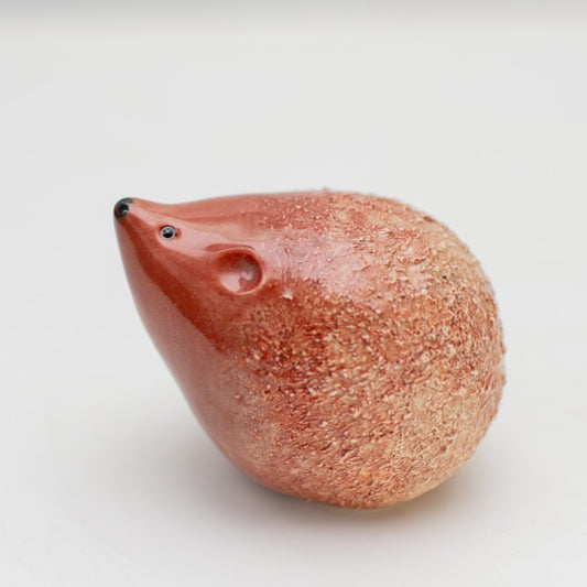 Shiny brown ceramic hedgehog