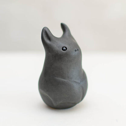 Small Ceramic Bat Sculpture, dark gray, with pointed ears and small black eyes