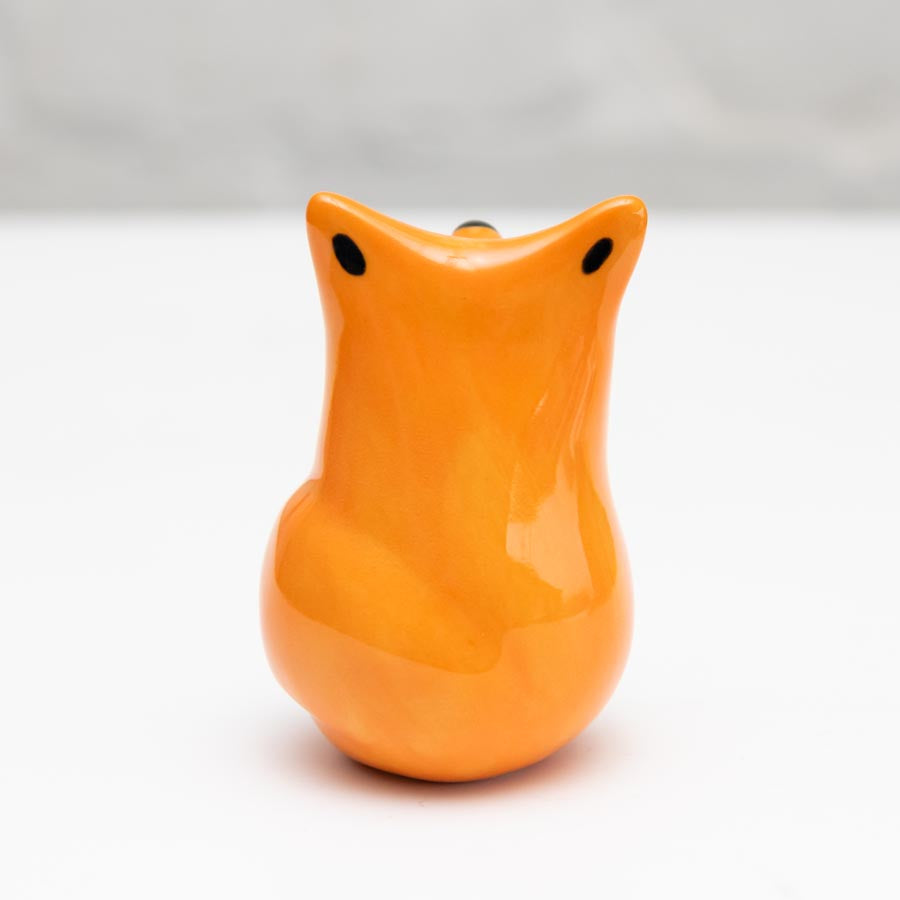 Curious Ceramic Fox Sculpture, rear view, orange with two black eyes