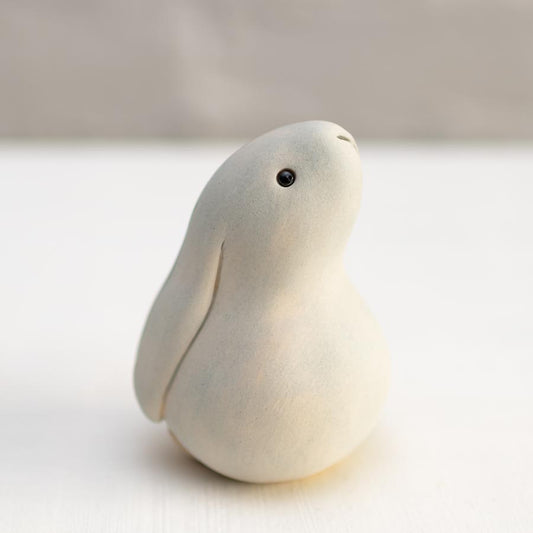 Grey Ceramic Bobbly Bunny Sculpture with black eyes and small nose