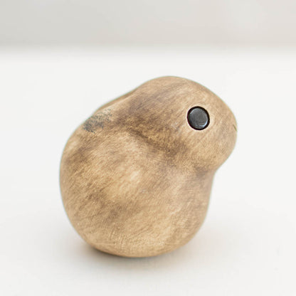 Small ceramic Leveret Sculpture, light brown with a single black eye