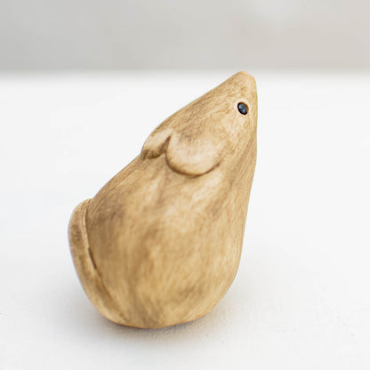 Small Ceramic Field Mouse Sculpture, light brown with black eye, facing right on white background