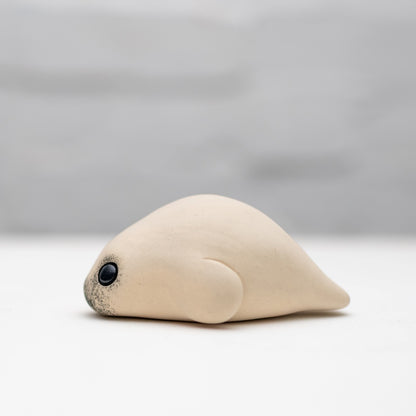 Small ceramic flat seal pup