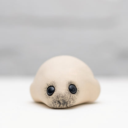 Small ceramic flat seal pup