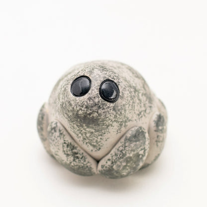 Grey ceramic spider sculpture