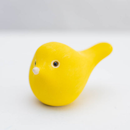 Cheerful Yellow Ceramic Bird Sculpture