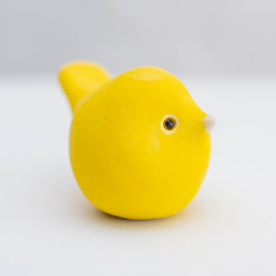 Cheerful Yellow Ceramic Bird Sculpture