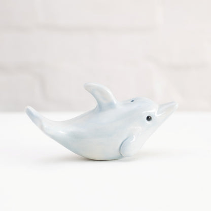 Small ceramic dolphin sculpture