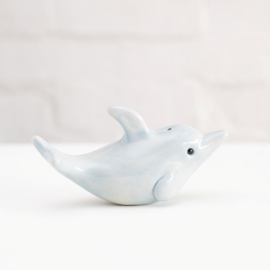 Small ceramic dolphin sculpture