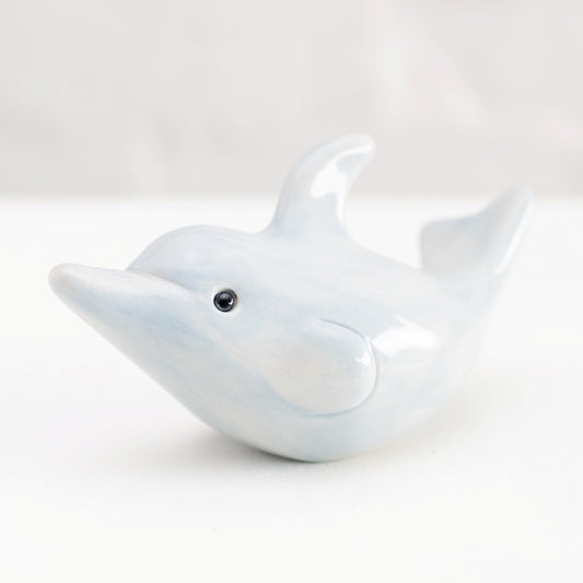 Small ceramic dolphin sculpture