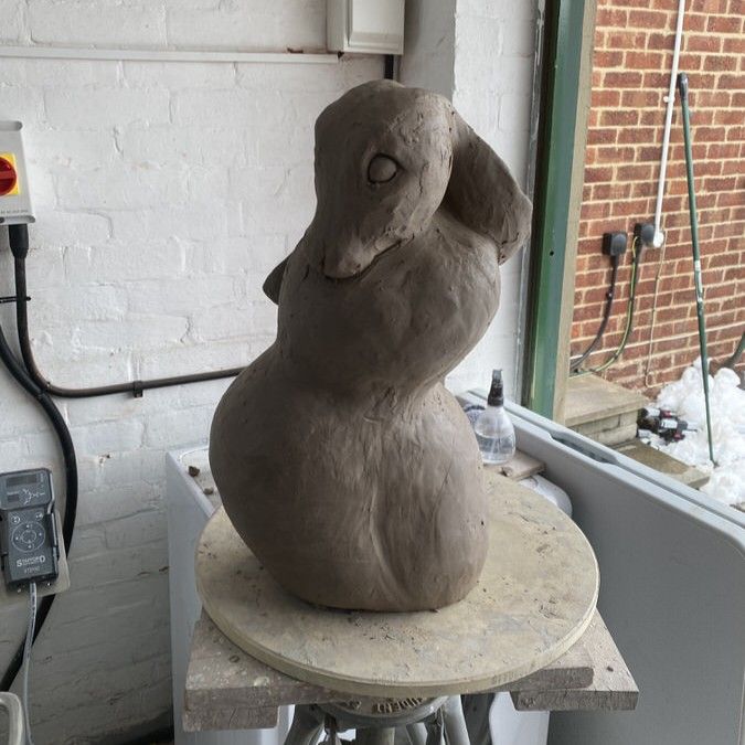 Clay sculpture of a hare in progress
