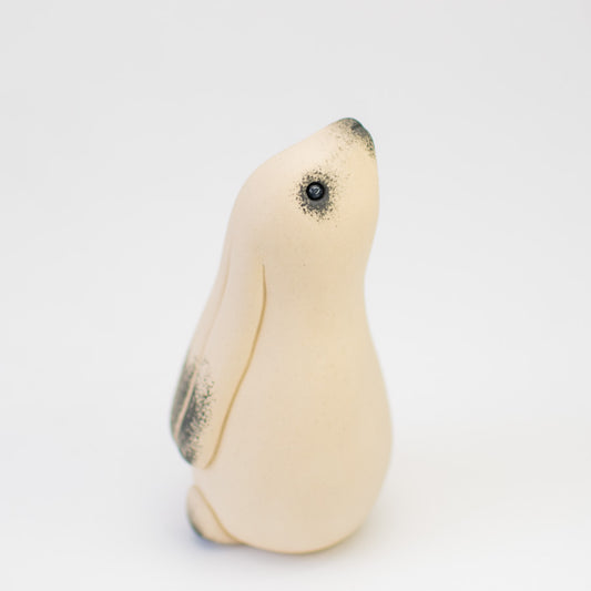 White ceramic moongazing hare sculpture with smooth flowing lines