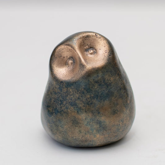 Smooth, small bronze owl figurine