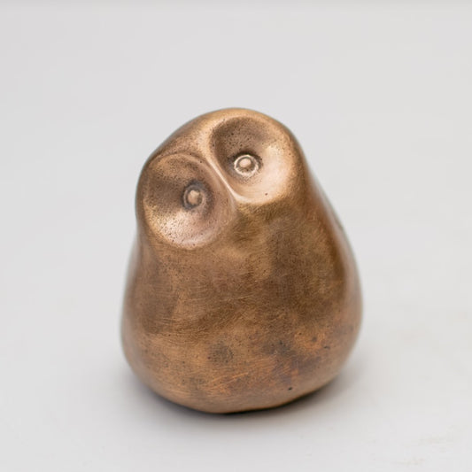 Smooth, small bronze owl figurine