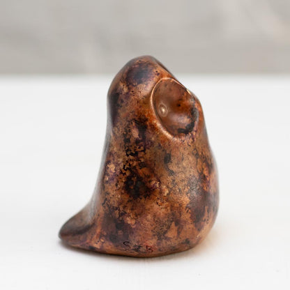 Small Foundry Cast Bronze Owl Sculpture in copper and purple, viewed from the side