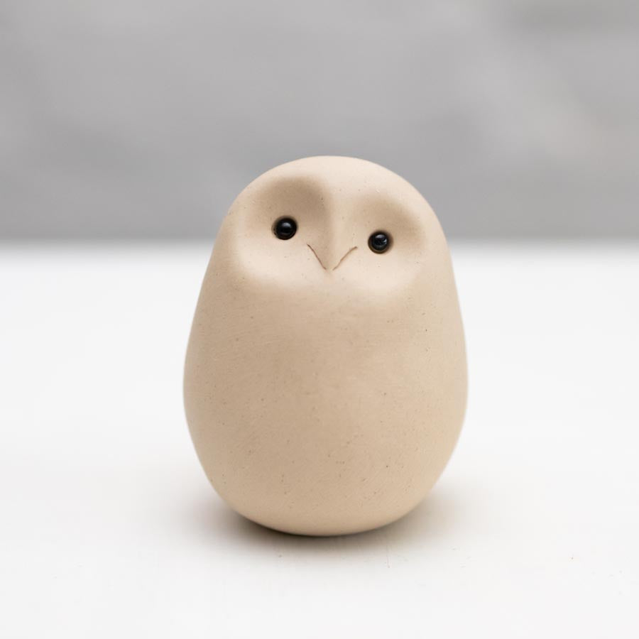 Small white ceramic owl
