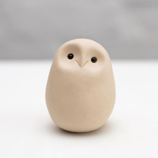 Small white ceramic owl