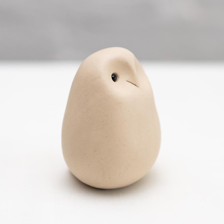Small white ceramic owl